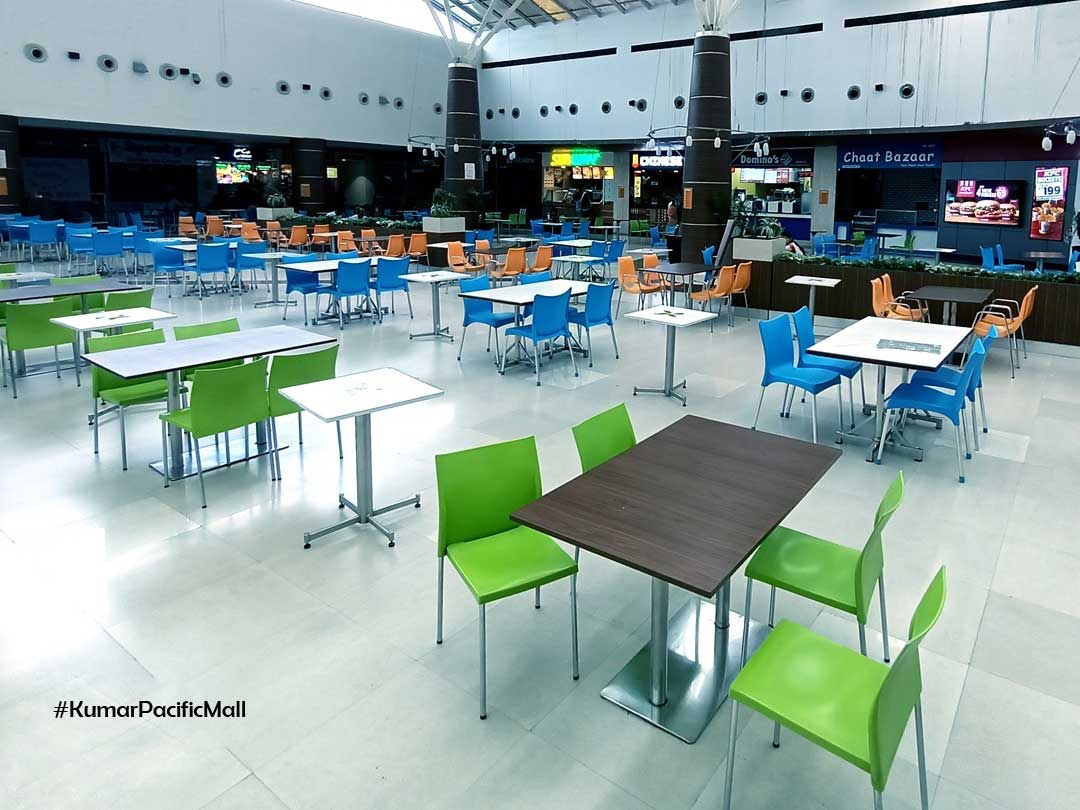 Spacious food court at Kumar Pacific Mall by Best Developers in Pune